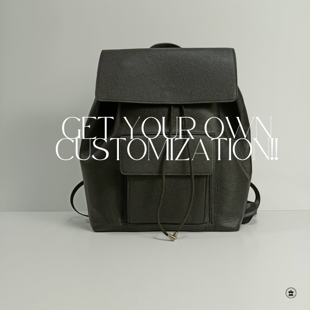 Close-up of luxury small leather backpack with gold hardware